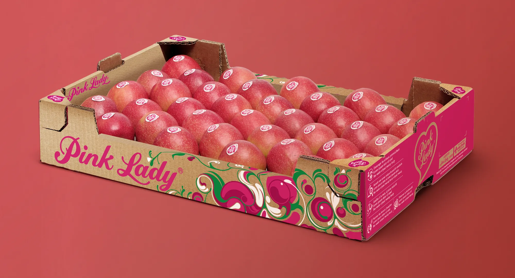 Diseño de packaging para manzanas Pink Lady, ilustración y sistema visual por Bassali.